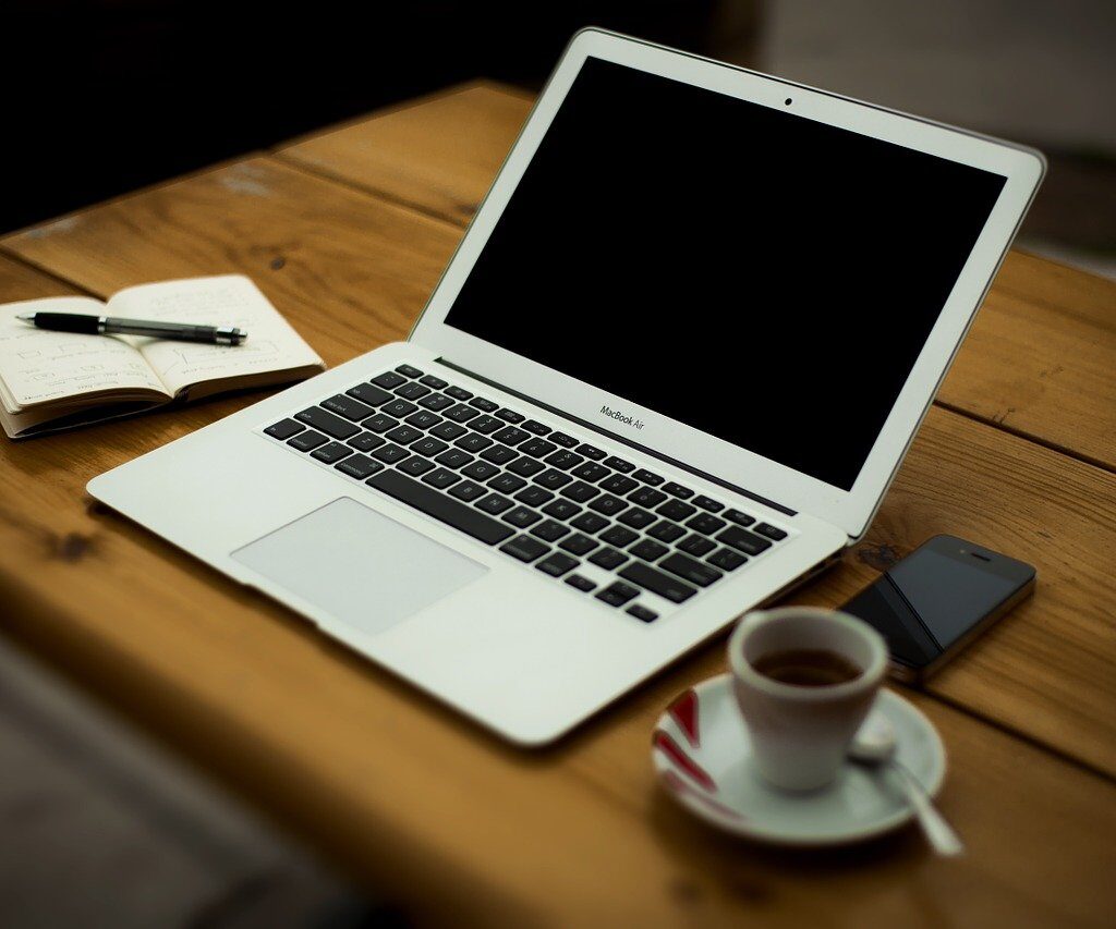 laptop sitting open on desk