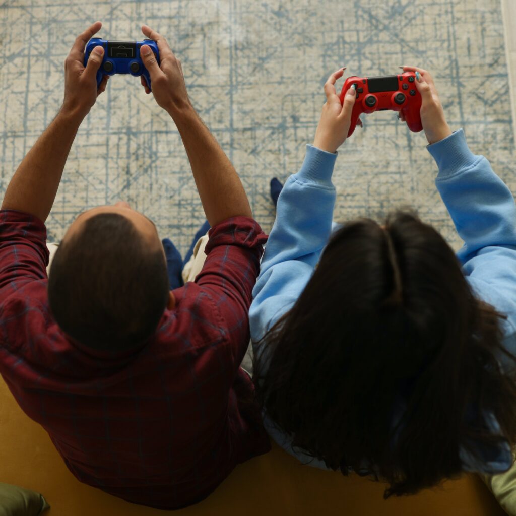 Man and woman gaming together.