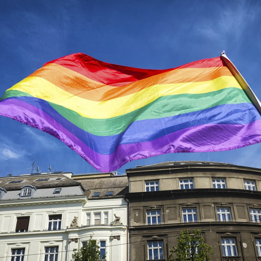 rainbow flag over architecture