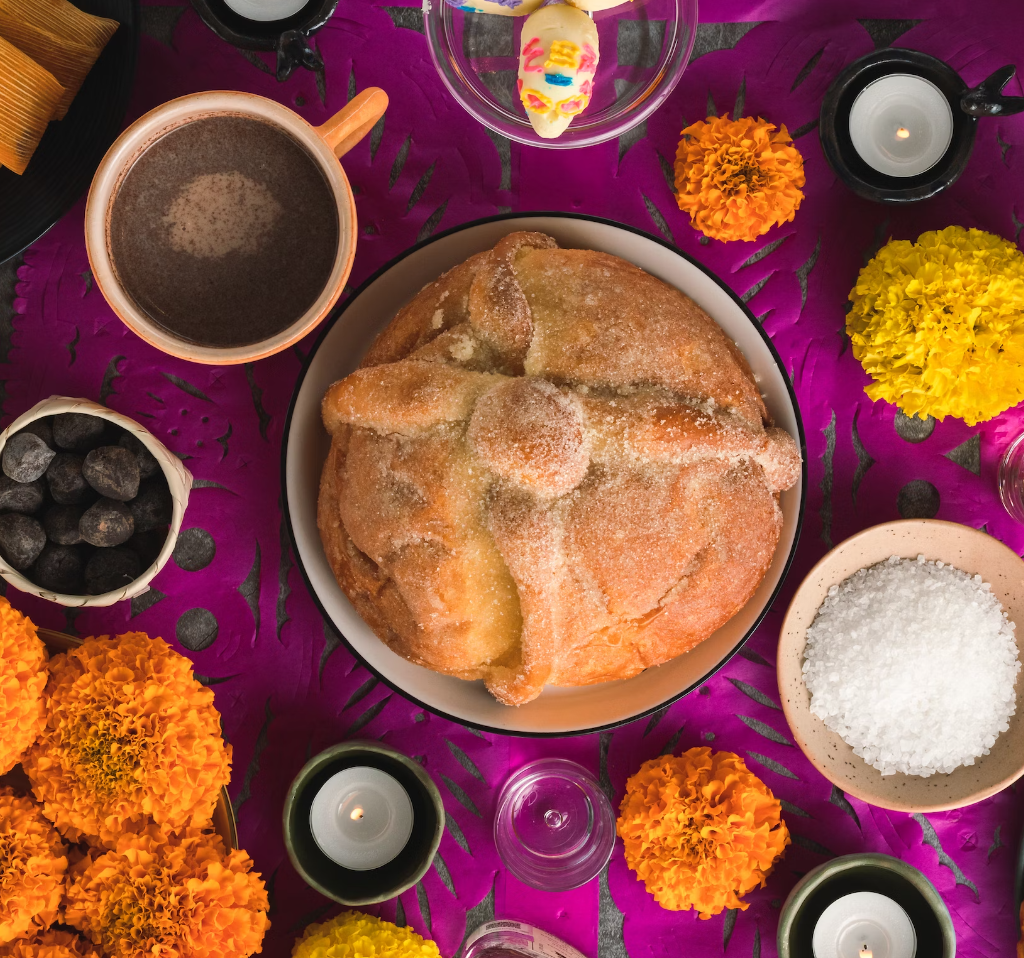 Pan de Muertos on a traditional Mexican dinner table.