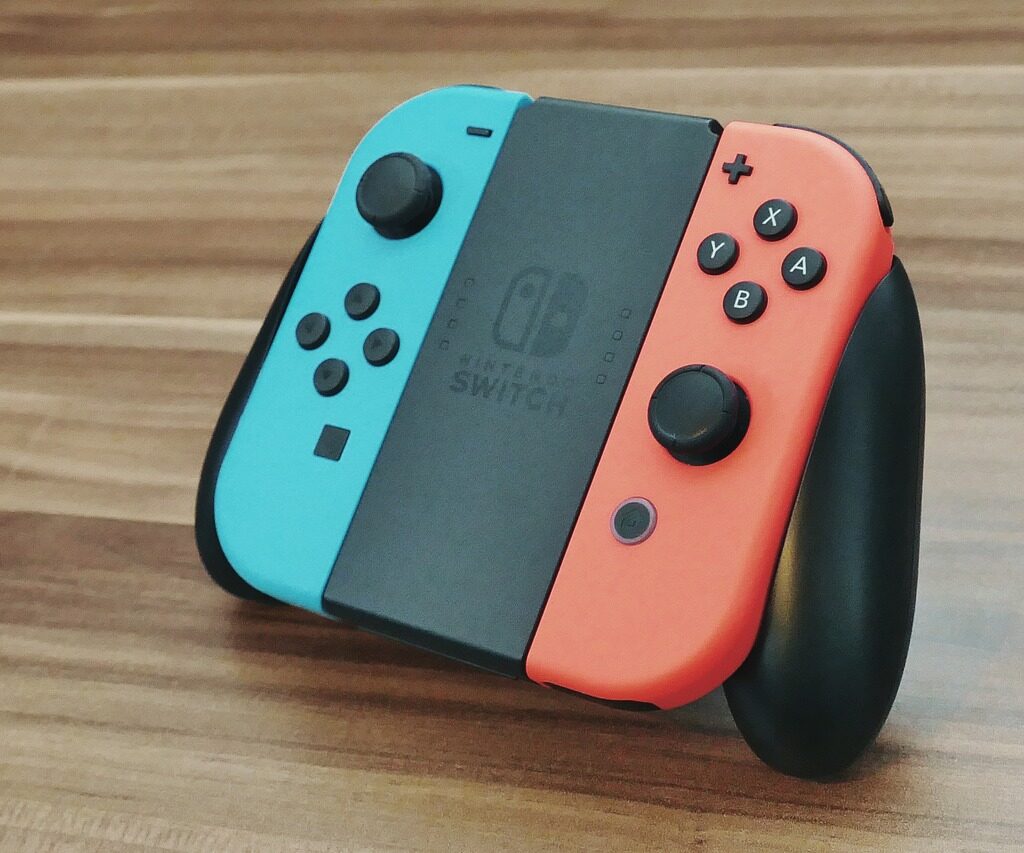 Nintendo Switch controller sitting on a table. 