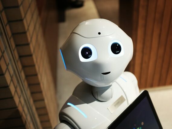 Artificial intelligence robot looking up at camera.