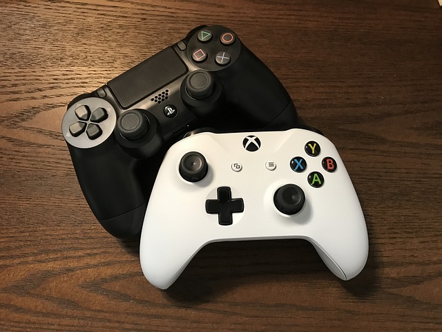 Black and white video game controllers for a console.