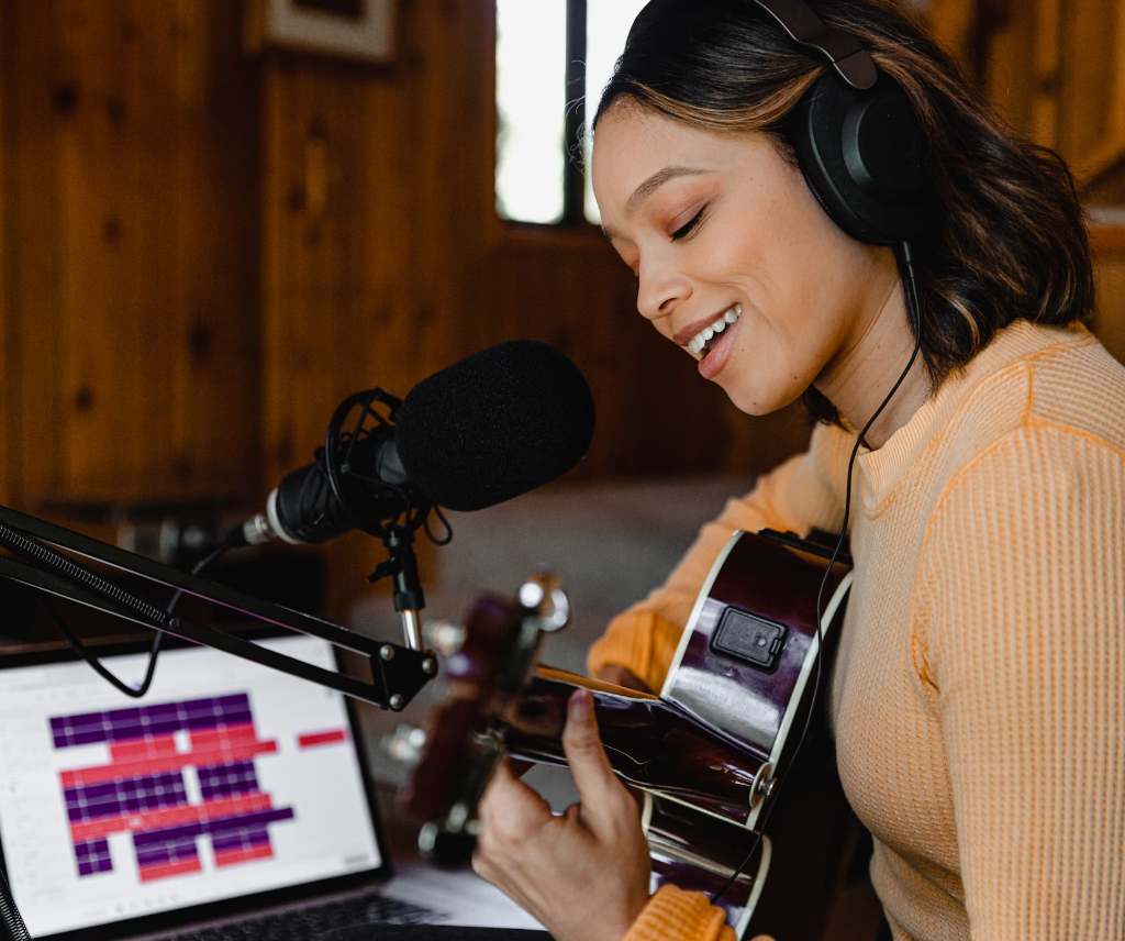 Musician recording a song.