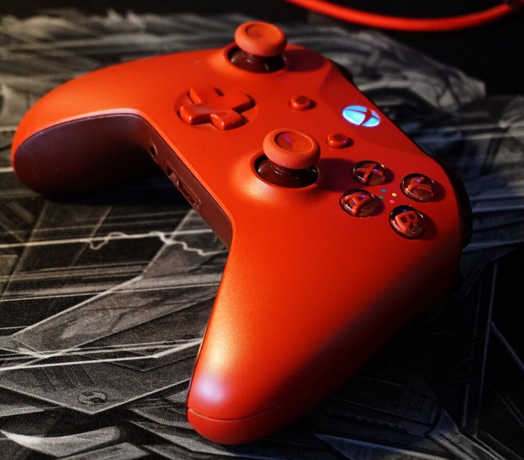 A red xbox gaming controller.