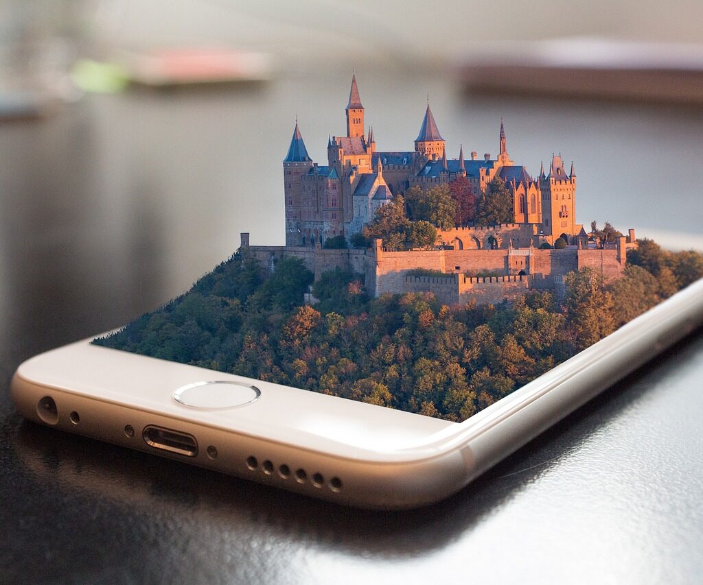 A phone with a 3D castle coming out of it.