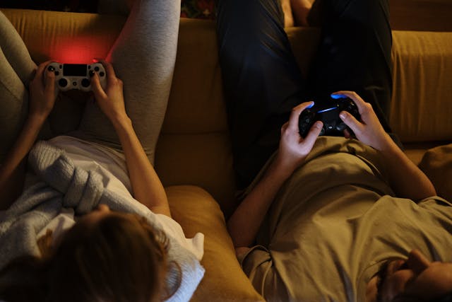 Two players holding two controllers.