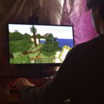 Gamer playing Minecraft.