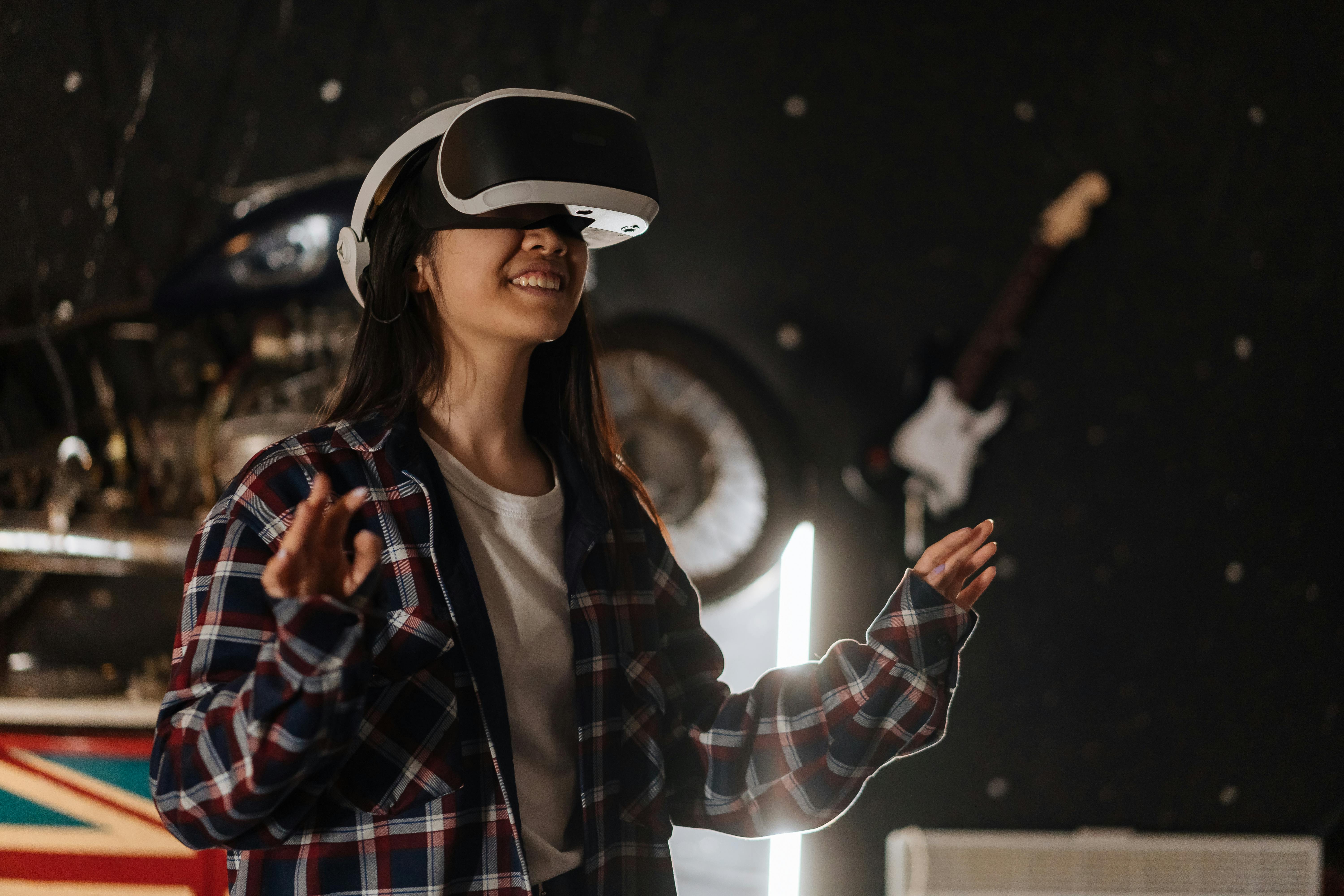 Happy woman using virtual reality goggles