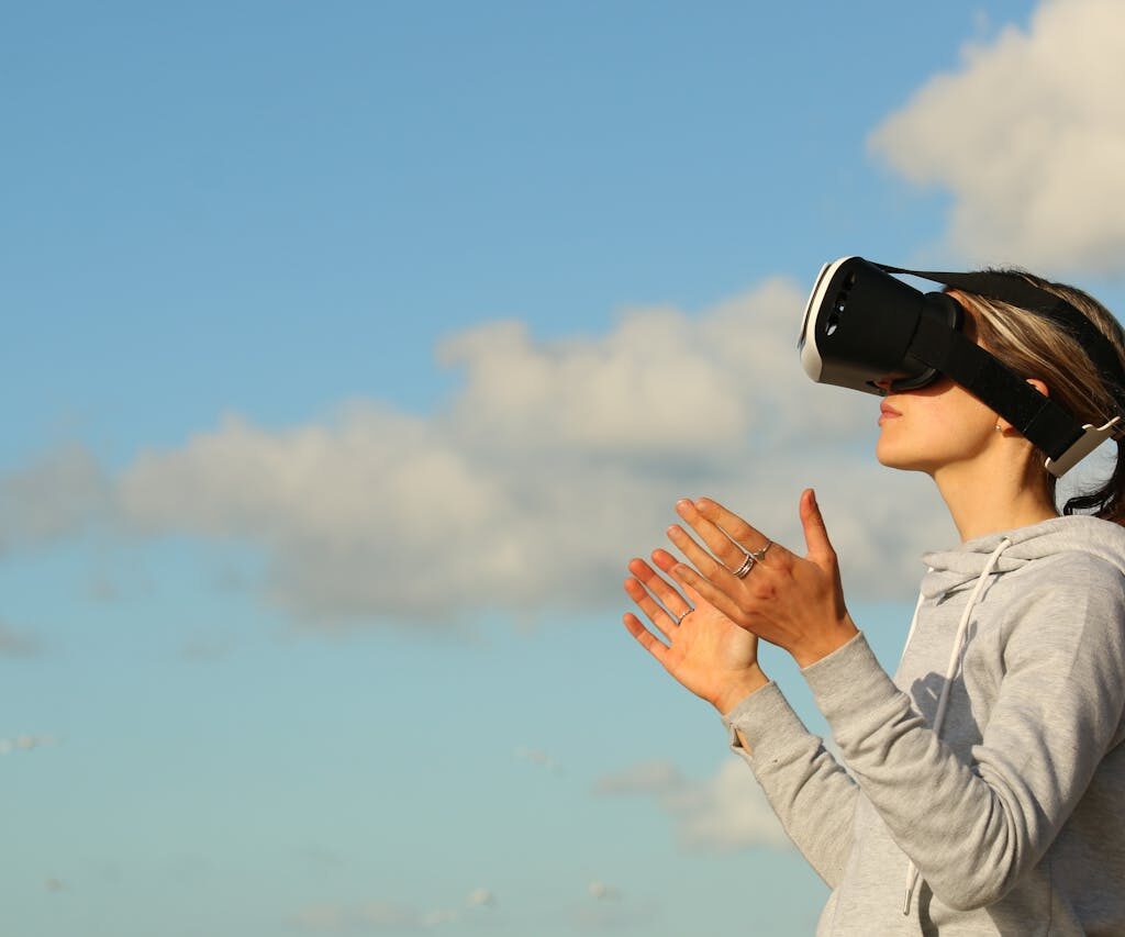 woman in vr headset with clouds in background