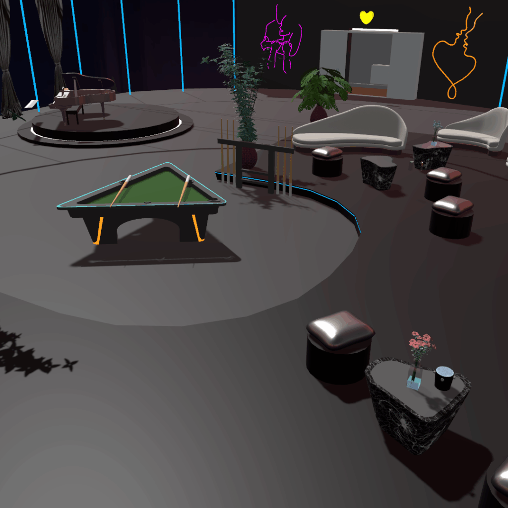 Alt text: A stylish virtual lounge in a VR environment with futuristic neon lighting. The space features curved cream sofas, marble tables with small flowers, and tall potted plants in red vases. A triangular pool table sits at the center with cue sticks nearby. In the background, there’s a piano on a raised stage, a large TV screen displaying neon text, and wall art of glowing line designs shaped like hearts and figures. The atmosphere is sleek and modern with a warm, ambient glow.