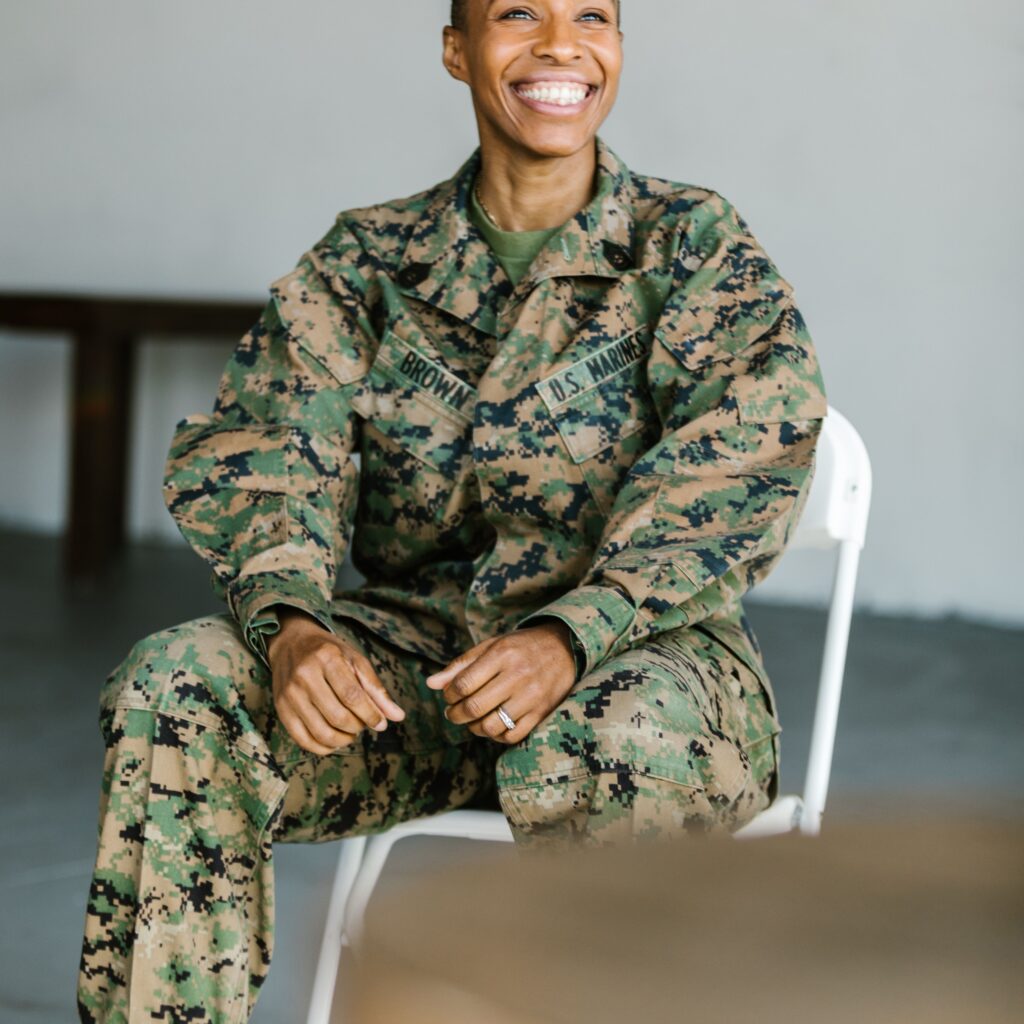 Woman soldier sitting down