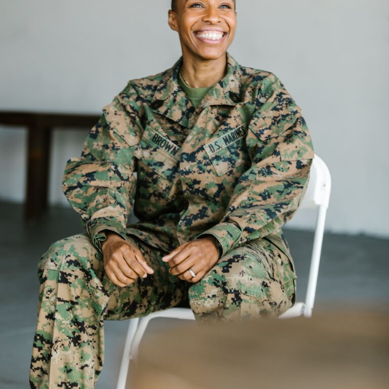 Woman soldier sitting down
